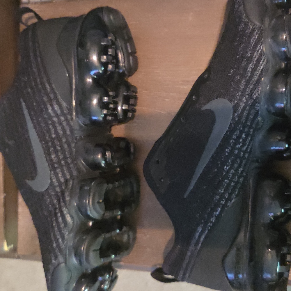 Nike Black Athletic Shoes with Flyknit Upper and VaporMax Cushioning